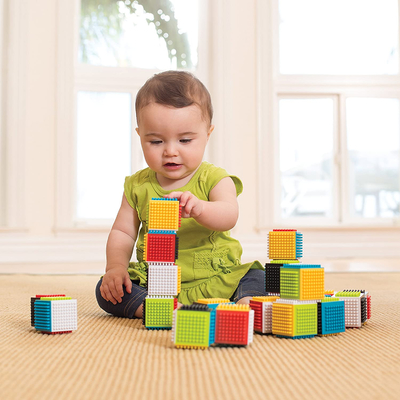 Báo chí giáo dục cho bé và lưu giữ các khối cảm giác để phát triển kỹ năng kỹ thuật