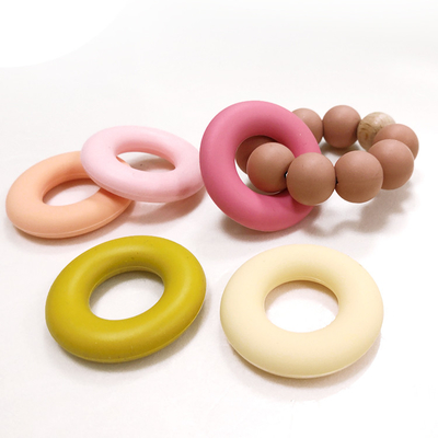 Vòng hạt silicone hình bánh rán buộc dây SGS 4.2 * 4.2 * 0.9cm cho bé